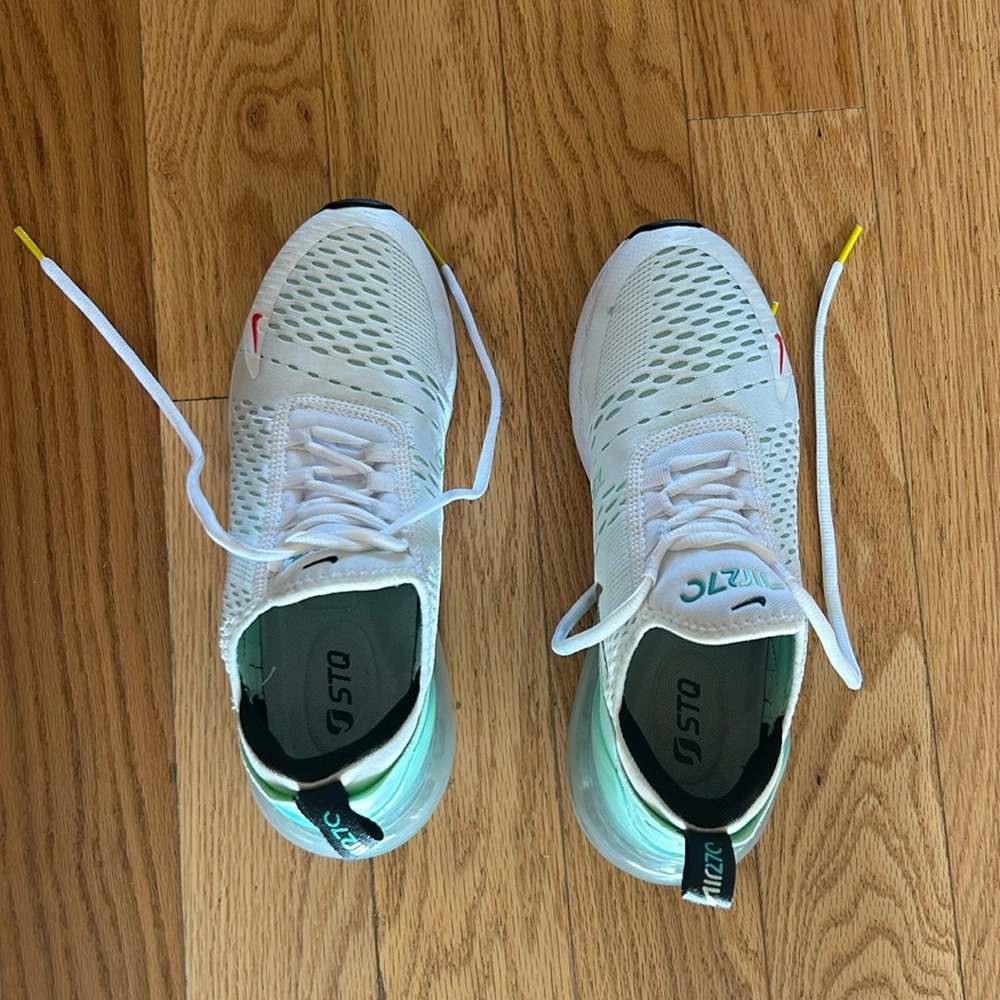 Size 8 women’s Nike white and teal sneakers